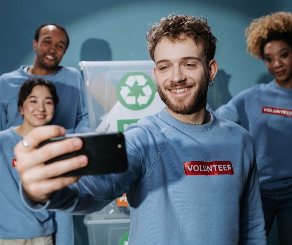 Volunteers at a nonprofit taking selfie