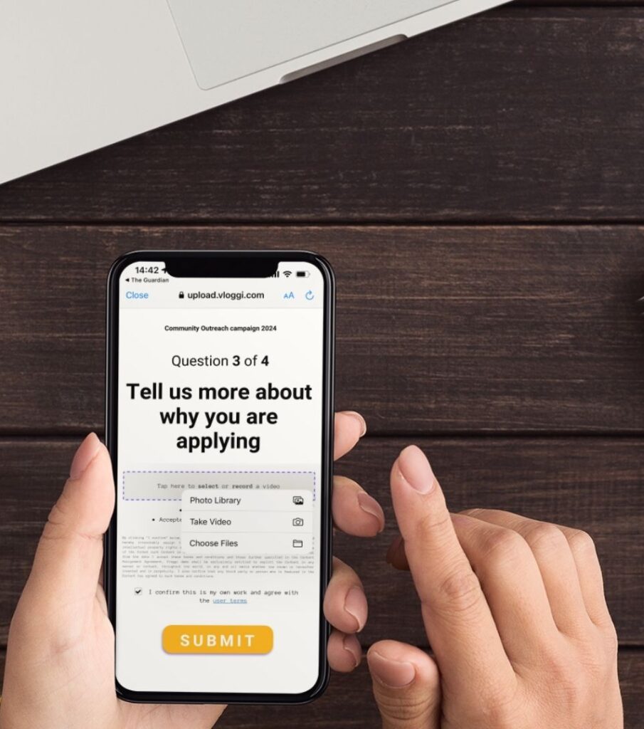 a person holding a phone with a question mark on the screen