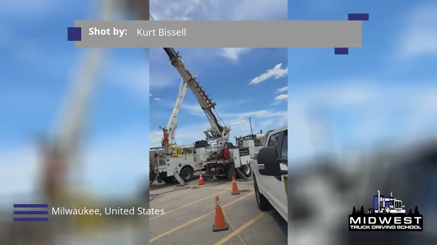 Midwest Truck Driving School contributor Kurt Bissell filming line-work equipment in Milwaukee